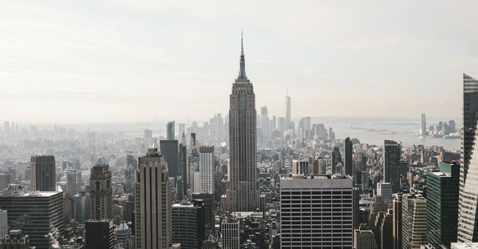 New York City skyline, with the Empire State Building in the center.