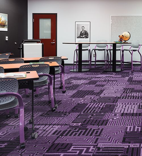 THINC Academy classroom with vibrant purple geometric carpet.