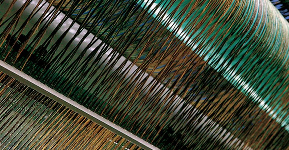 Yarn fiber on a carpet tufter.