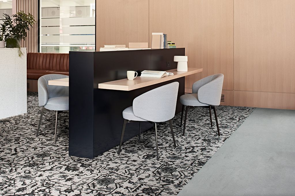 Decades carpet tile from Interface with norament 926 rubber flooring from nora