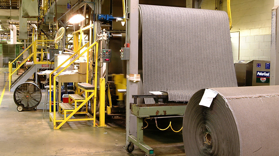 The Kyle plant backs tufted products, cuts and inspects them before preparing them for shipment.
